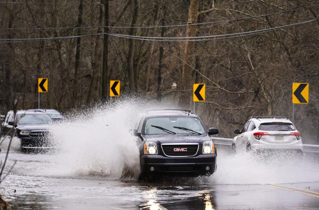 Major cleanup underway after storm batters Northeastern US, knocks out power and floods roads