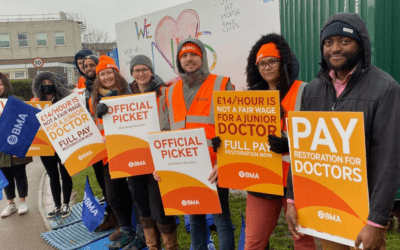 Thousands of doctors in Britain walk off the job in their longest-ever strike