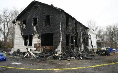 Four children killed as a fire tears through a multifamily home in Connecticut