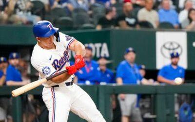 Jared Walsh homers after watching new teammates get World Series rings as Rangers beat Cubs 11-2