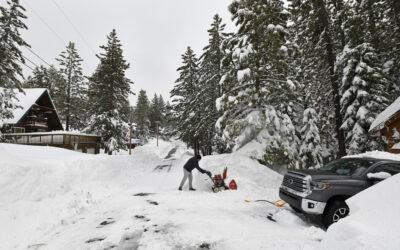 California ski resort workers tunnel their way into the office after getting 10 feet of snow