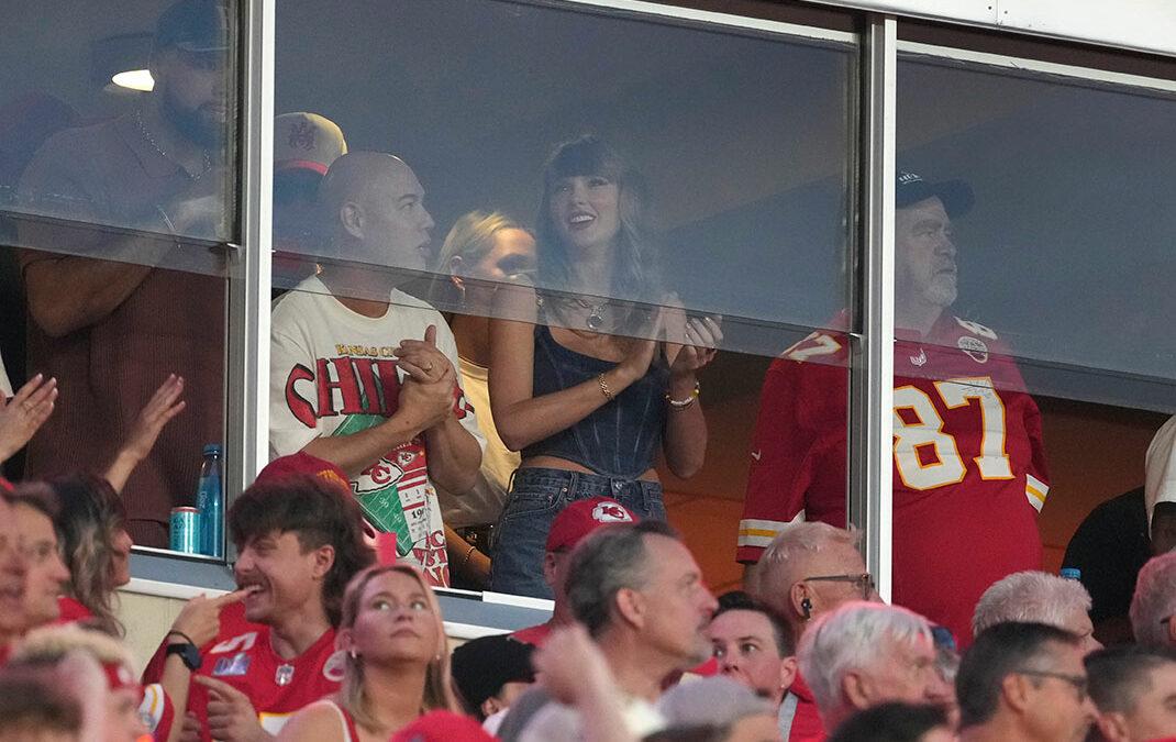 Taylor Swift is seen in a suite before the start of an NFL football game between the Kansas City Chiefs and the Baltimore Ravens Thursday, Sept. 5, 2024, in Kansas City, Mo. (AP Photo/Ed Zurga)